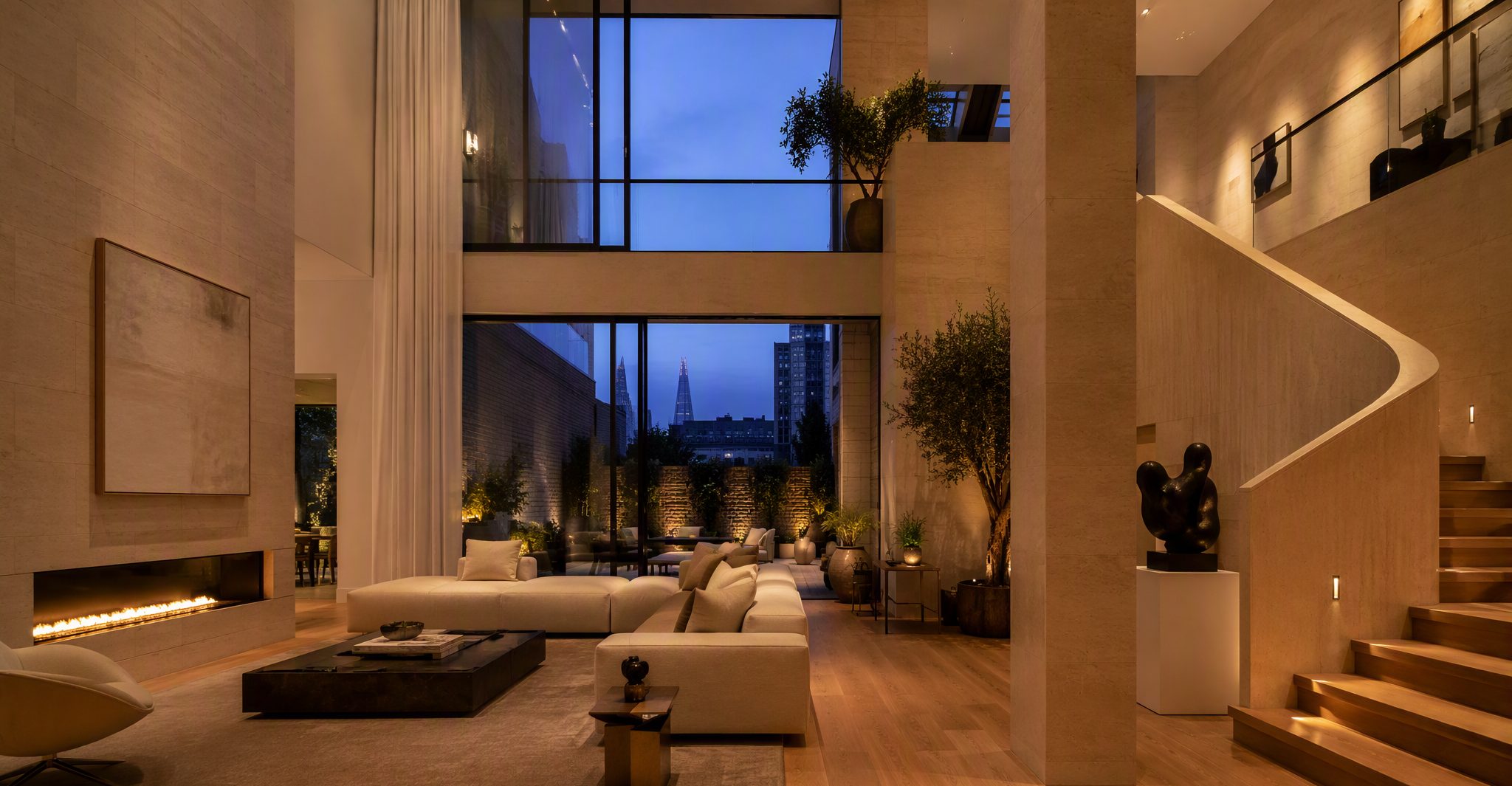 Double-height luxury London living space in warm stone and oak, designed as concept showcase imagery